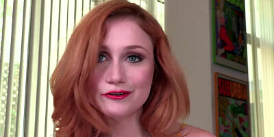 Redheaded hottie talking dirty while giving you a BJ