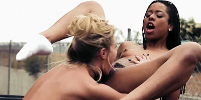 Interracial lesbian session featuring porn queens