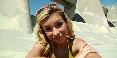 Carmen Caliente posing on the skateboard outdoor