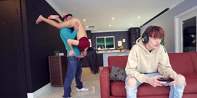 Kimmy Kim is sucking Tyler's cock as her BF is playing video games