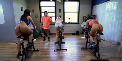 Rose Monroe shows her butt while riding the exercise bike