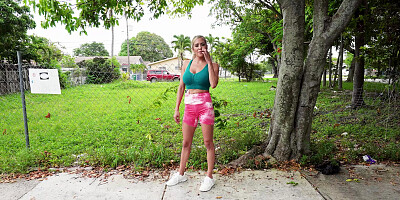 Caitlin Bell is getting picked up outdoors