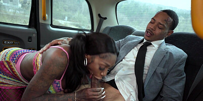 Ebony Mystique is sucking black dick on the backseat