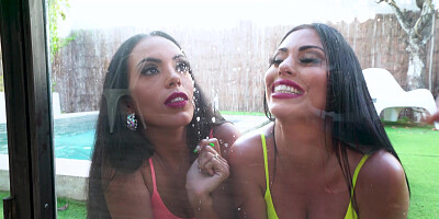 Katrina Moreno and Sapphire Lapiedra show off their asses poolside