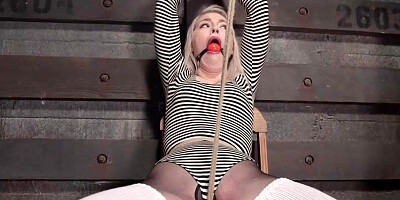 Gagged blonde slave crotch roped over tights