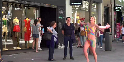 Busty blonde celebrates Pride on the streets