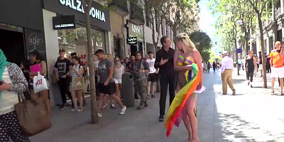 Busty blonde celebrates Pride on the streets