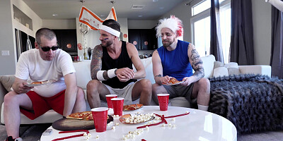 Katie Morgan is cleaning the kitchen while the guys are watching a game