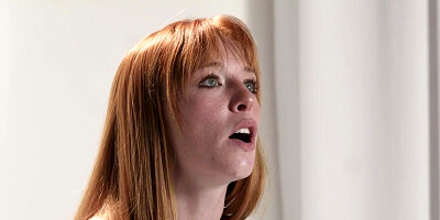 Inked redhead solo toying her muff after doing interview