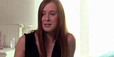 Long-haired cutie tenderly fingers own pussy in the bedroom