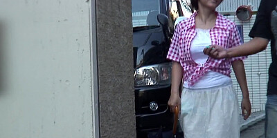 Oriental female tempts young man into playing with her pussy