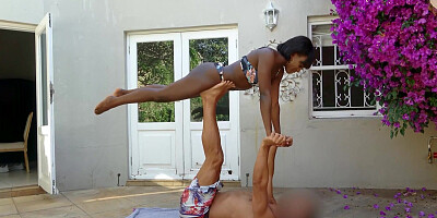 Ebony teen does acro yoga on a big cock