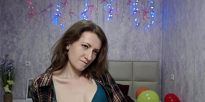 Brunette babe unbuttons her shirt