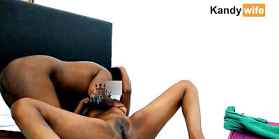 His face enveloped in fat ass