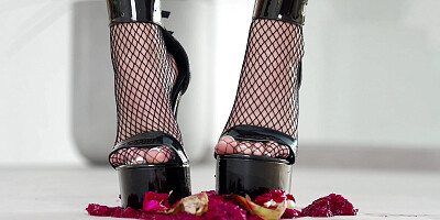 Petite girl crushes fruits with high heels! Hot footfetish!