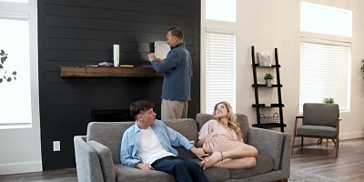 She is trying not to moan while riding his huge dong