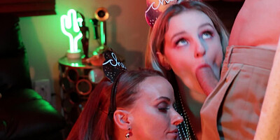 Two girls are sharing a hard cock at the birthday party