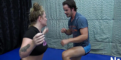 Busty Blonde Babe Dominating Her Man in Wrestling