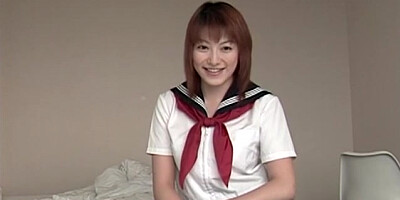 Charming Asian coed pleased with a vibrating toy dick