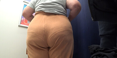 The camera in the fitting room watches a mature big ass in satin panties. Curvy milf changes clothes. PAWG