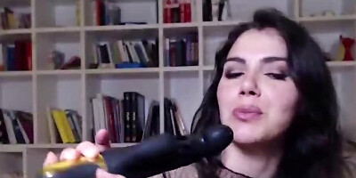 Horny brunette Valentina Nappi is playing with a curved dildo