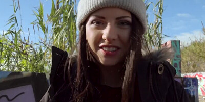 Amateur cutie is giving a nice blowjob on the street