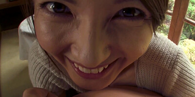 Pretty Asian girl is filmed POV-style while sucking a dick