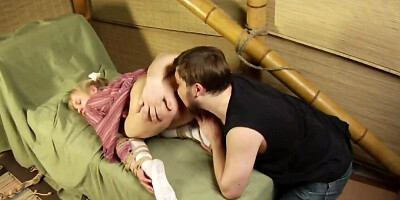 Sweet blonde chick is tied up and dominated by a master