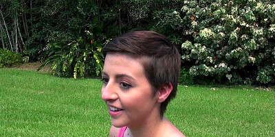 Guy with camera tricks short-haired gal into giving outdoor BJ