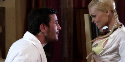 A blonde with a sexy short skirt is fucked on the bed