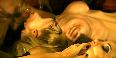 Two hot pirate ladies perform kinky things to a man in the bed