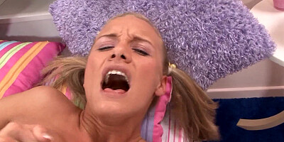 A blonde whore that loves to fuck is on the bed, exposed for us