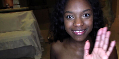 A black chick is kissing a large white dick close up to us