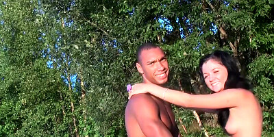 Eighteen-year-old brunette from Russia blows black cock outdoors