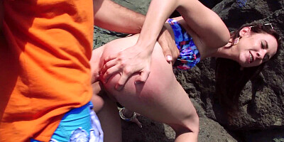 A small breasted cunt is fucked on some cliffs by the sea