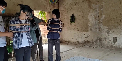Two Girls Suspended In An Abandoned House