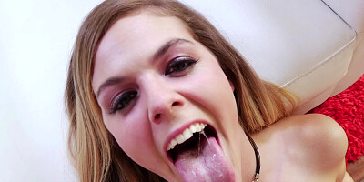 A babe with a pretty mouth is handling a cock with her face