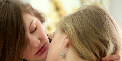 Two girls that love licking one another are on the bed, fucking