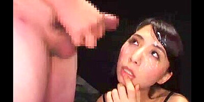 I took turns cuming in the face of a beautiful woman sitting on the floor in a bikini.