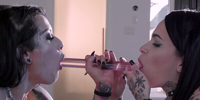 Brunette lesbians with tattoos and sex toys have crazy fun