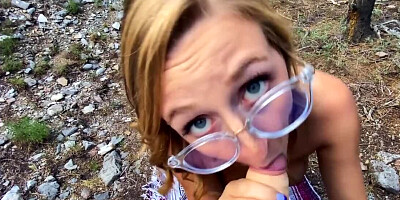 Nerdy girl Molly Pills sucks a hard cock and rides it in the woods