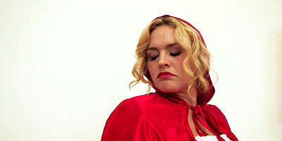 A blonde is getting cum on her sexy face today in this scene