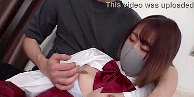 The vibrator is inserted into her, her legs are spread in an M shape, and the fingering is inserted into her.