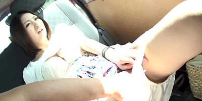 Asian amateur Ran Minami is giving a blowjob in the car