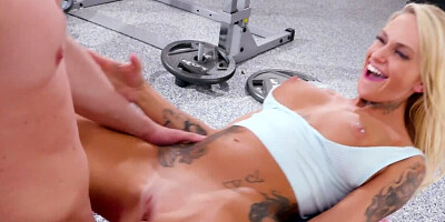 Inked blonde with fit body sucks dick and copulates in the gym