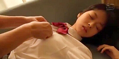 She takes out her breasts, licks them, takes off her panties, and is given cunnilingus by her fingers.