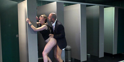 Bald man in suit fucks swanky chick's anus in the restroom