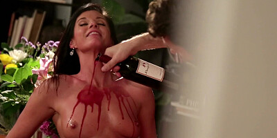 A hot bitch is on the wooden desk, getting penetrated deeply