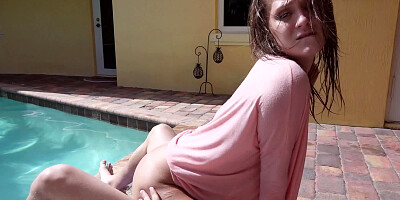 Outdoor fucking session of a sexy brunette and her man at the poolside