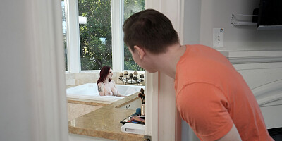 Redhead MILF blows stepson in the bathroom and gets fucked